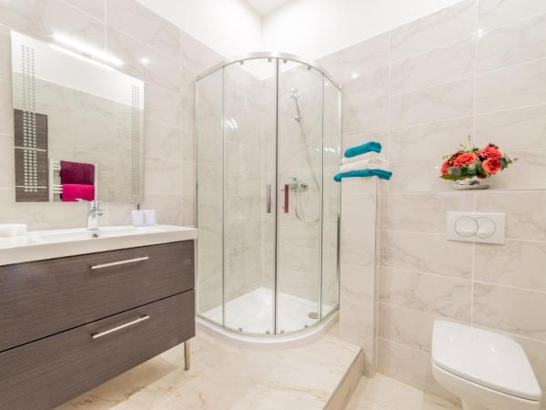 Global Suites Budapest : photo 3 de la chambre chambre double ou lits jumeaux deluxe - vue sur ville