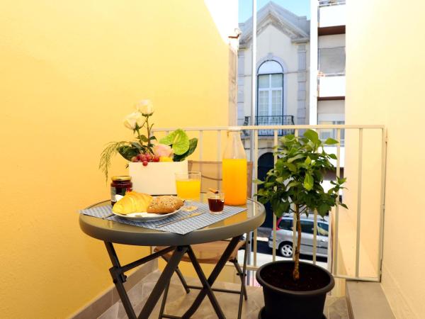 Le Jardin Secret de Faro Guesthouse : photo 1 de la chambre chambre double deluxe avec balcon