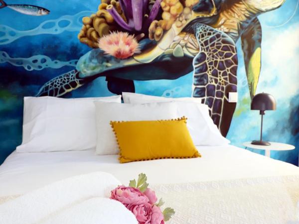 Le Jardin Secret de Faro Guesthouse : photo 2 de la chambre chambre double deluxe avec balcon