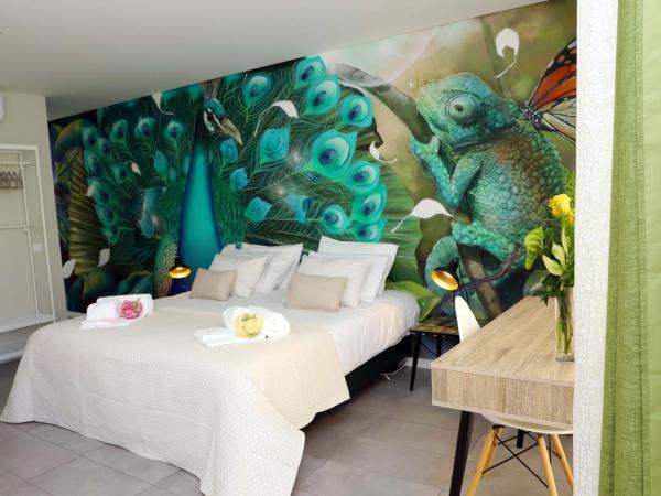 Le Jardin Secret de Faro Guesthouse : photo 10 de la chambre studio avec terrasse