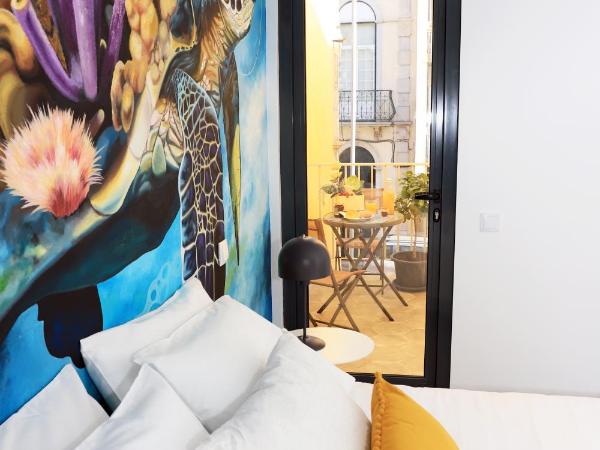 Le Jardin Secret de Faro Guesthouse : photo 6 de la chambre chambre double deluxe avec balcon