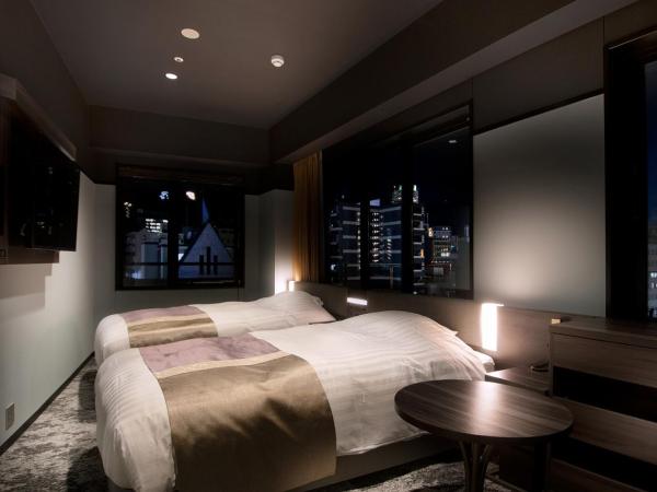 Kobe Plaza Hotel West : photo 1 de la chambre chambre lits jumeaux d'angle