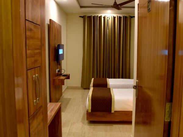 Hotel Triveni Residency : photo 6 de la chambre chambre double ou lits jumeaux standard