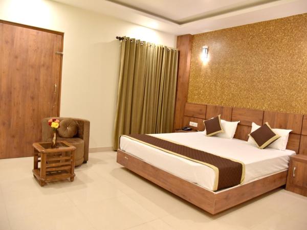 Hotel Triveni Residency : photo 5 de la chambre chambre lit king-size deluxe