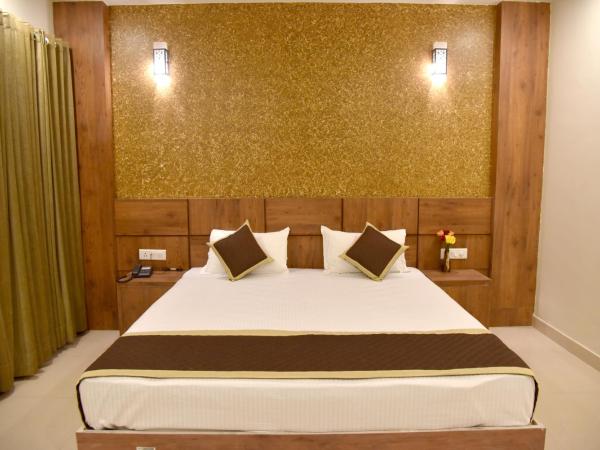 Hotel Triveni Residency : photo 7 de la chambre chambre lit king-size deluxe