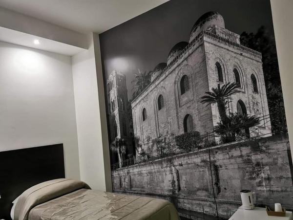 Due Passi Suite : photo 2 de la chambre chambre triple avec balcon