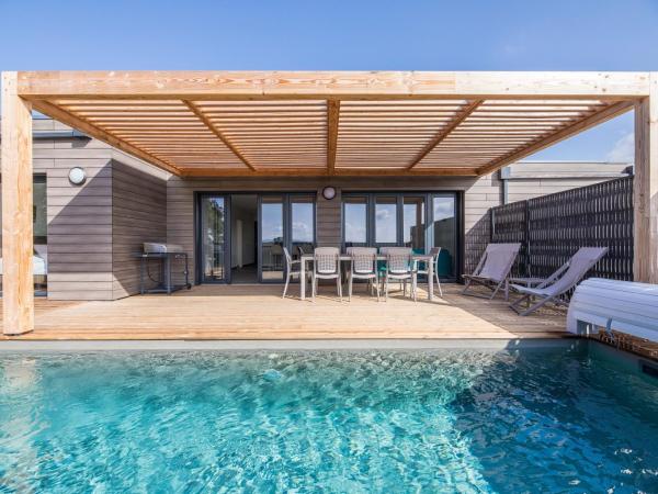 Résidence Pierre & Vacances Premium Les Terrasses d'Arsella : photo 1 de la chambre maison 4 chambres avec climatisation, piscine privée de 7 mètres et terrasse (8 adultes)