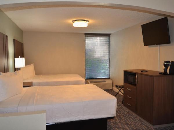 Opal Hotel & Suites : photo 5 de la chambre hébergement exécutif avec 2 lits queen-size rénové