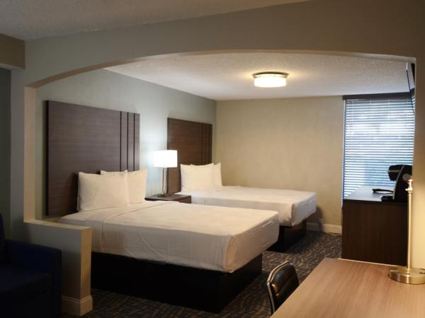 Opal Hotel & Suites : photo 7 de la chambre hébergement exécutif avec 2 lits queen-size rénové