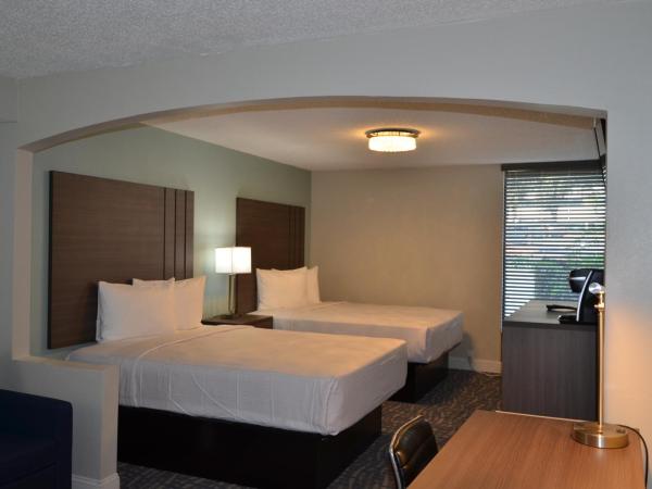 Opal Hotel & Suites : photo 8 de la chambre hébergement exécutif avec 2 lits queen-size rénové