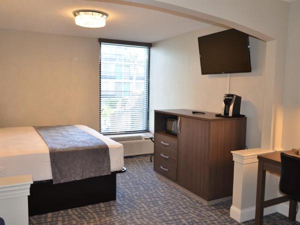 Opal Hotel & Suites : photo 3 de la chambre chambre lit king-size exécutive rénovée