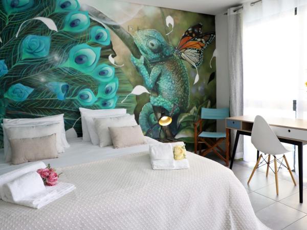 Le Jardin Secret de Faro Guesthouse : photo 1 de la chambre studio avec terrasse