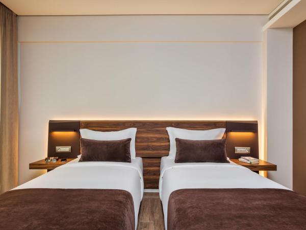 Imperial Plus Urban Smart Hotel Thessaloniki : photo 4 de la chambre hébergement deluxe lits jumeaux - vue sur ville