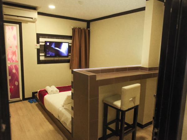 HOTEL PREMIUM : photo 5 de la chambre chambre lit king-size standard