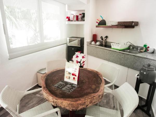 Hotel Paradise Suites : photo 4 de la chambre chambre double - vue sur jardin