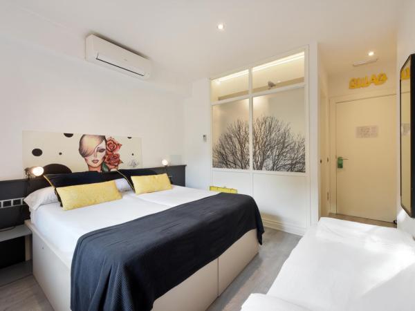 Free Hostels Barcelona : photo 1 de la chambre chambre double avec lit d'appoint