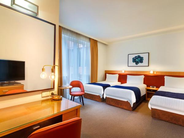 BEST WESTERN PLUS Travel Inn : photo 2 de la chambre chambre triple deluxe