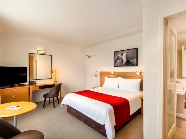 BEST WESTERN PLUS Travel Inn : photo 1 de la chambre chambre lit queen-size deluxe