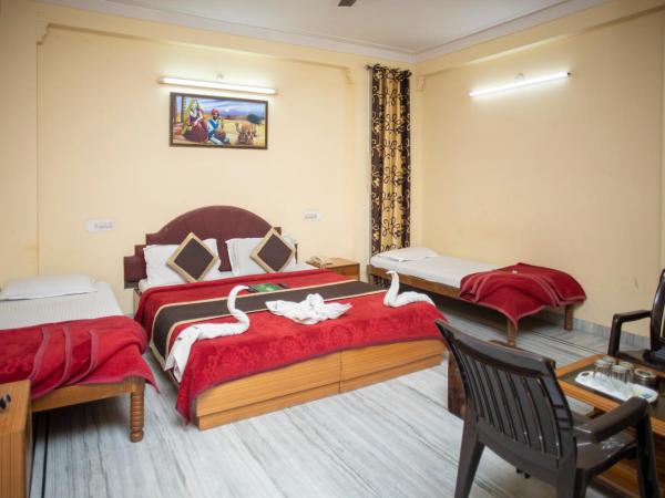 Hotel Dimple International : photo 1 de la chambre chambre familiale