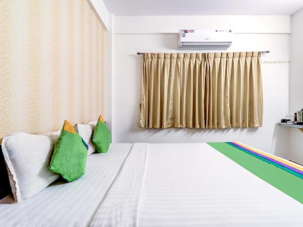 Treebo Saga Apartment : photo 5 de la chambre [sanitized] standard double room