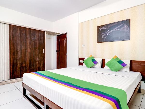 Treebo Saga Apartment : photo 2 de la chambre [sanitized] deluxe double room