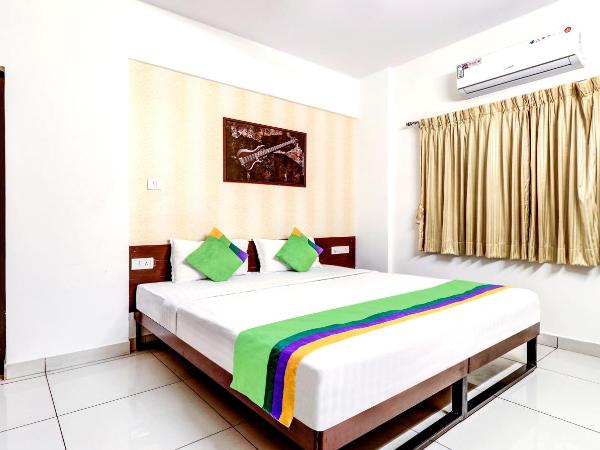 Treebo Saga Apartment : photo 1 de la chambre [sanitized] deluxe double room
