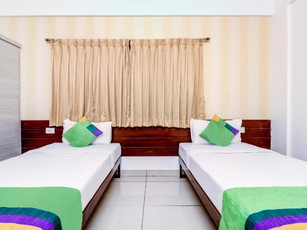 Treebo Saga Apartment : photo 4 de la chambre chambre double supérieure [assainie]