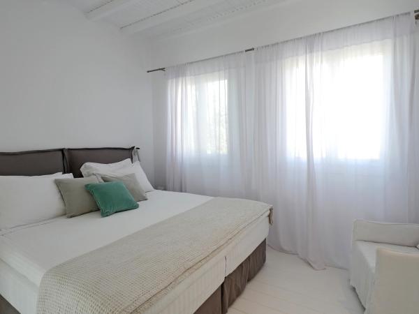 Ostraco Suites : photo 9 de la chambre suite avec bain à remous extérieur - vue sur mer 