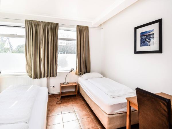 Guesthouse Aurora : photo 5 de la chambre chambre double ou lits jumeaux avec salle de bains commune