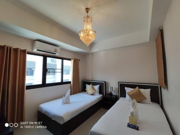 Bann Tawan Hostel Chiang Rai : photo 1 de la chambre chambre lits jumeaux deluxe