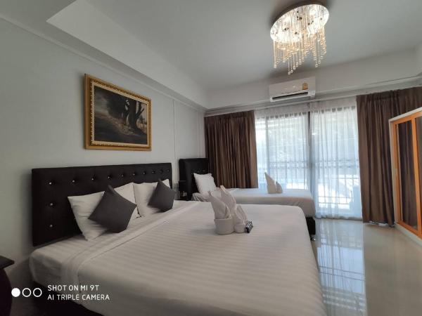 Bann Tawan Hostel & Spa : photo 3 de la chambre chambre triple