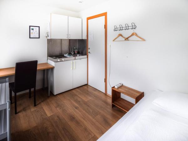 Guesthouse Andrea : photo 1 de la chambre chambre simple standard avec salle de bains commune