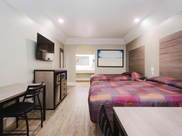 Palace Inn Beltway 8 & Westview : photo 5 de la chambre chambre supérieure avec 2 lits queen-size