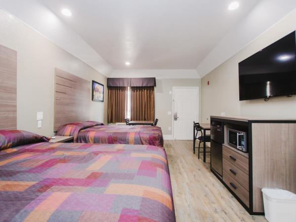 Palace Inn Beltway 8 & Westview : photo 4 de la chambre chambre supérieure avec 2 lits queen-size