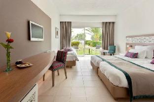 Le Sultan : photo 1 de la chambre chambre simple - vue sur jardin