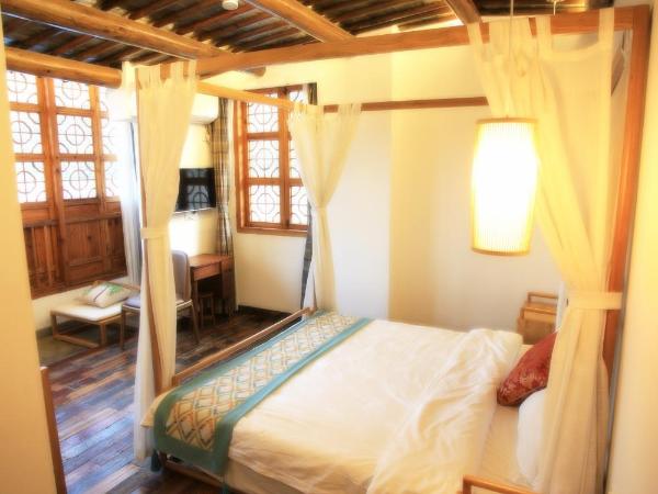 Begonia Flowers Guesthouse : photo 1 de la chambre chambre supérieure lit queen-size