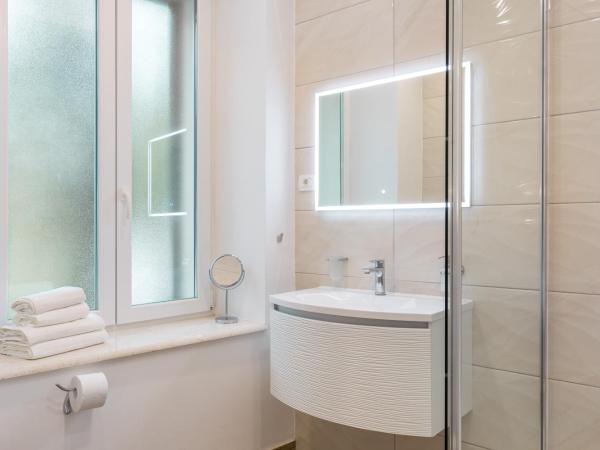 Pellegrini Luxury Rooms : photo 6 de la chambre chambre double ou lits jumeaux deluxe - vue sur ville