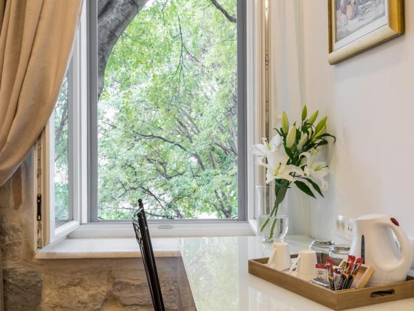 Pellegrini Luxury Rooms : photo 3 de la chambre chambre double ou lits jumeaux deluxe - vue sur ville