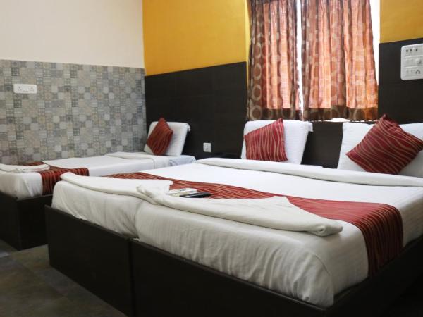 Season 4 Residences -Thiruvanmiyur Near Tidel park Apollo Proton cancer center and IIT Madras Research Park : photo 1 de la chambre chambre familiale deluxe