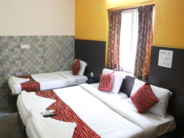 Season 4 Residences -Thiruvanmiyur Near Tidel park Apollo Proton cancer center and IIT Madras Research Park : photo 2 de la chambre chambre familiale deluxe