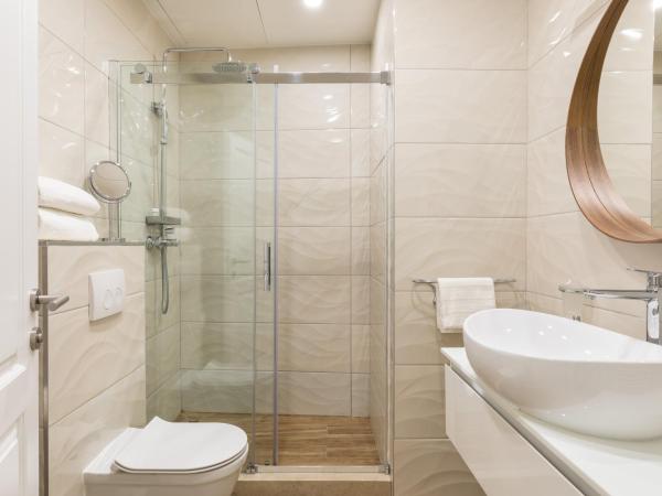 Pellegrini Luxury Rooms : photo 8 de la chambre chambre double deluxe - vue sur jardin