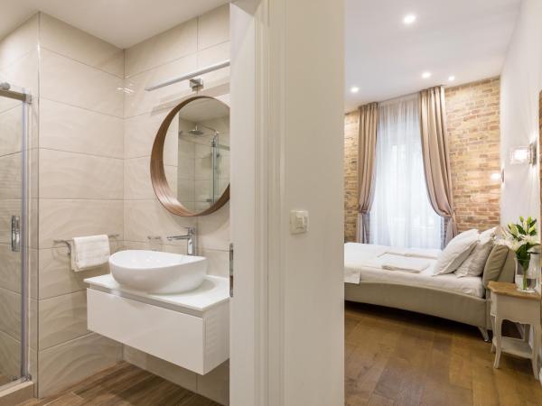 Pellegrini Luxury Rooms : photo 7 de la chambre chambre double deluxe - vue sur jardin