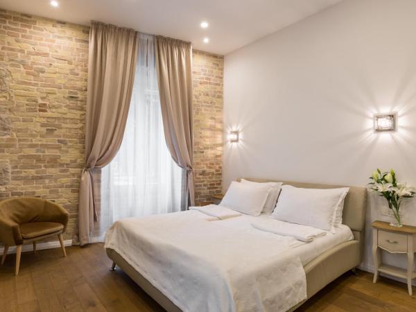 Pellegrini Luxury Rooms : photo 10 de la chambre chambre double deluxe - vue sur jardin