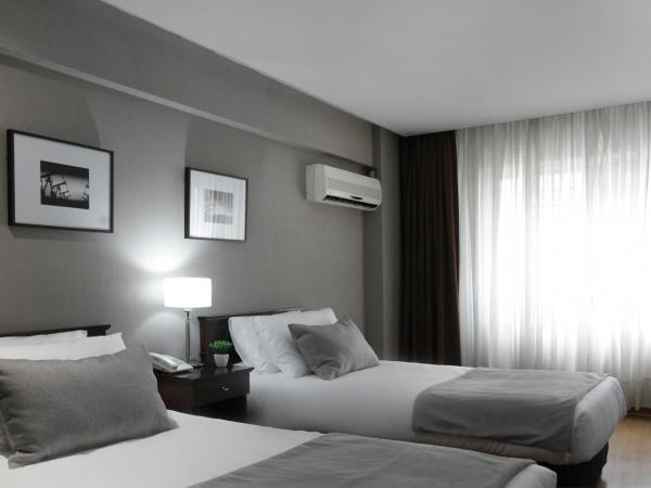 Hotel 8 de Octubre : photo 6 de la chambre chambre lits jumeaux supérieure