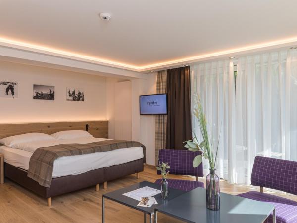 Hotel Bella Vista Zermatt : photo 1 de la chambre suite jardin avec terrasse - vue sur cervin