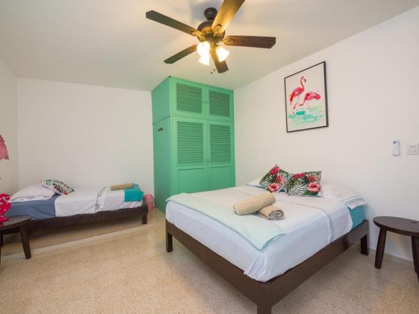 Casa Tropical : photo 8 de la chambre chambre triple avec salle de bains commune