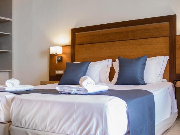 Manousos City Hotel : photo 1 de la chambre chambre lits jumeaux