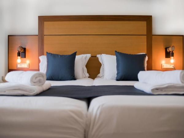 Manousos City Hotel : photo 2 de la chambre chambre lits jumeaux