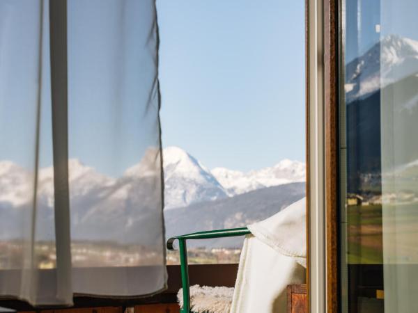 Hotel Kögele mit Restaurant bei Innsbruck Axamer Lizum : photo 7 de la chambre chambre familiale avec balcon