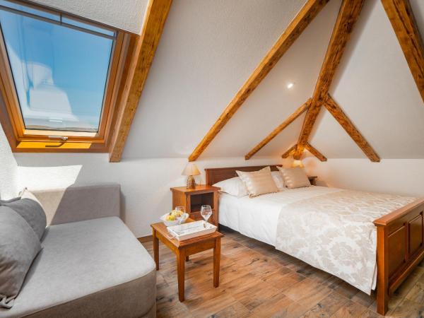 Villa Trau d`oro : photo 1 de la chambre chambre triple mansardée